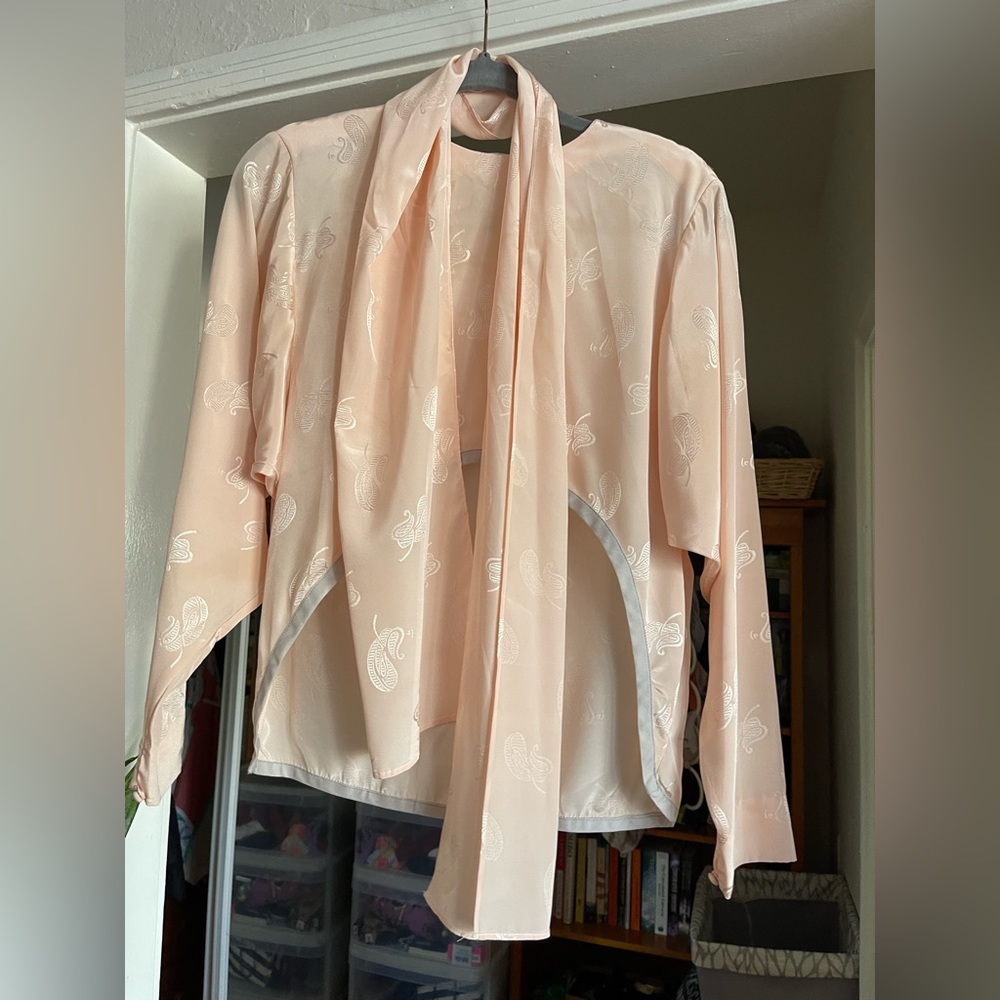 Soft peach silk blouse cropped in the front